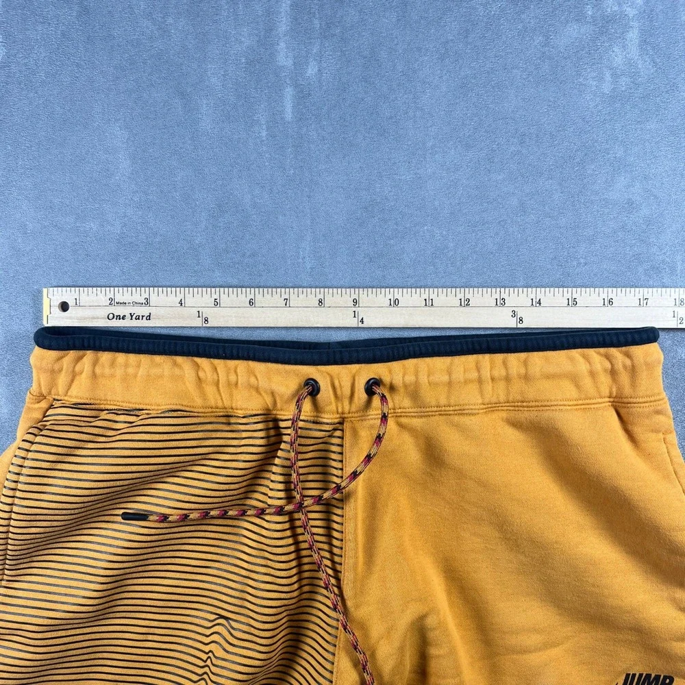 Jordan Nike Jumpman Mens Fleece Shorts Large Yellow Gold Stripe Graphic